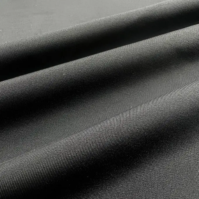 Dupont Lycra swimming cloth four side elastic single side warp knitted nylon plain fabric nylon matte knitted swimsuit fabric (3).jpg