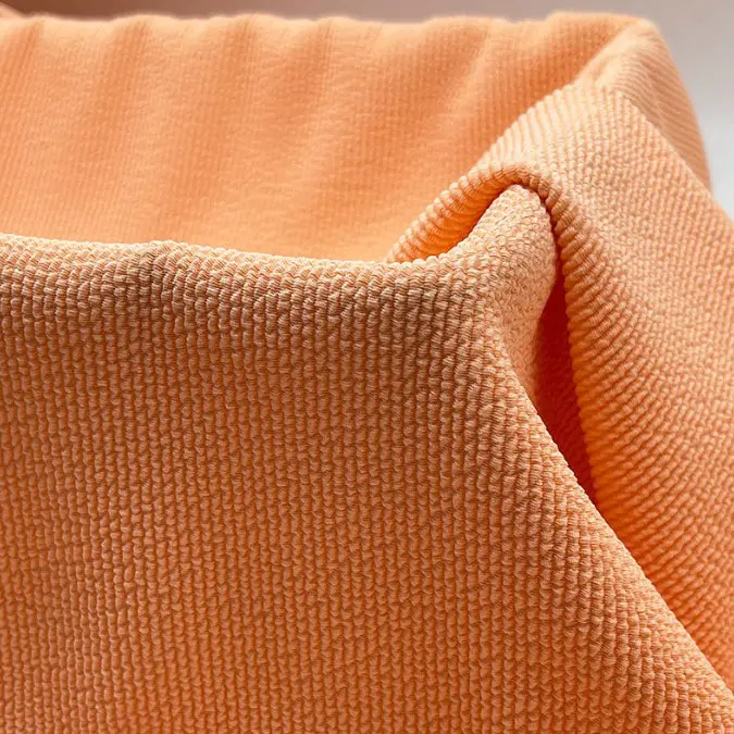 New polyester ammonia crinkle fabric jacquard polyester stretch European and American bikini swimsuit fabric (3).jpg