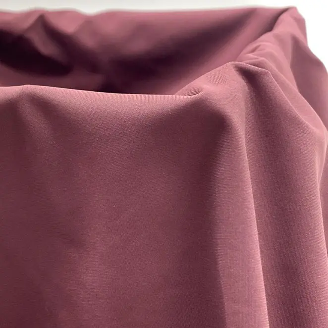 Warp knitted nylon lycra elastic fabric with double warp flat ice silk and quick-drying casual sports fabric (2)