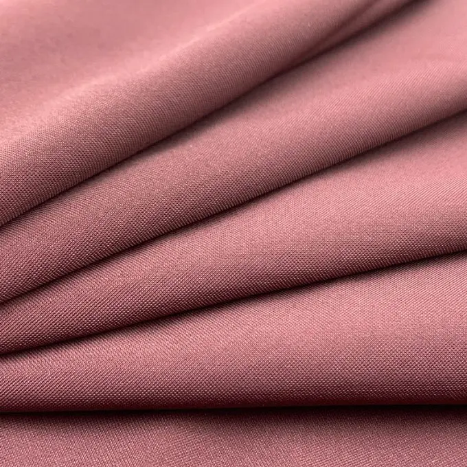 Warp knitted nylon lycra elastic fabric with double warp flat ice silk and quick-drying casual sports fabric (5).jpg