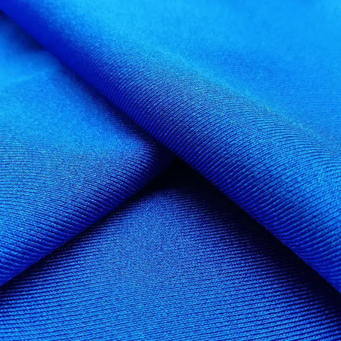 Polyester thickened Lycra stretch swimsuit fabric warp knitted polyester ammonia glossy swimsuit fabric knitted sports fabric (4).jpg